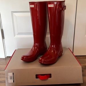 Brand New Hunter Boots. Glossy, Bright red. Size 10.